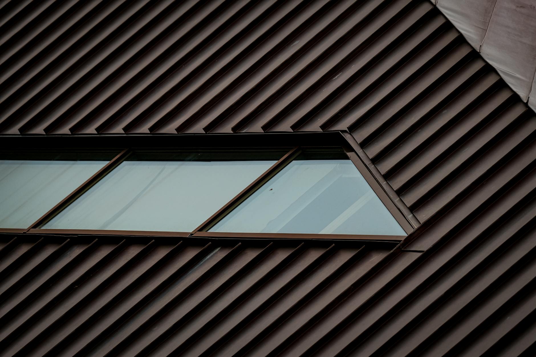Standing-seam metal roof detail with concealed fasteners